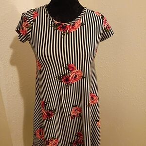 Discreet Black and White Striped Dress with Pink Floral Accents